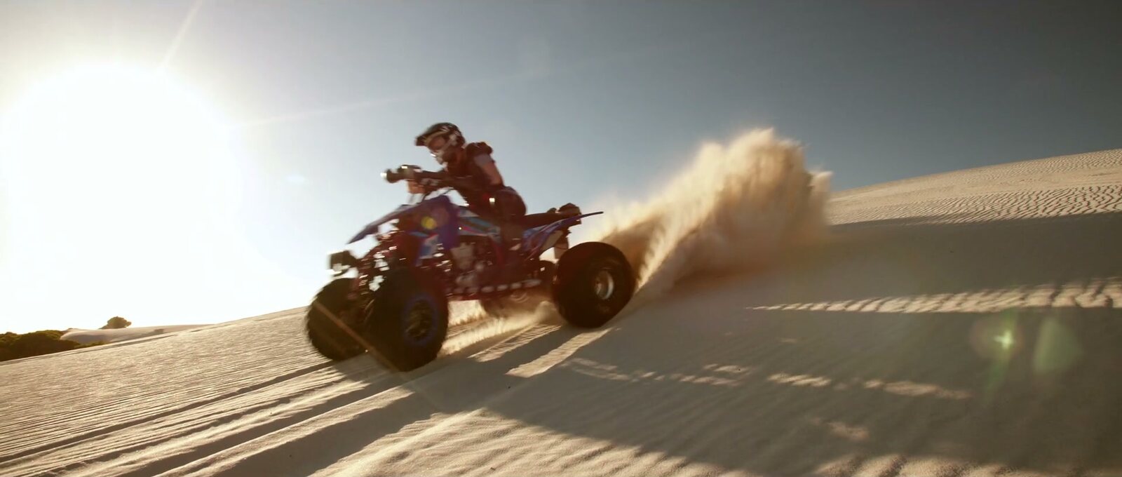 Liwa International Festival: a quad bike on the dune, a still from the commercial