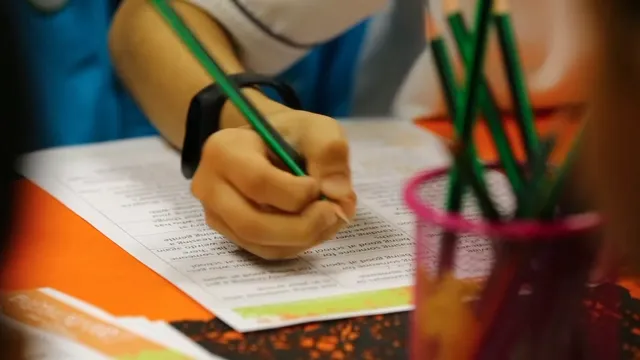 A child drawing at the first day’s workshop
