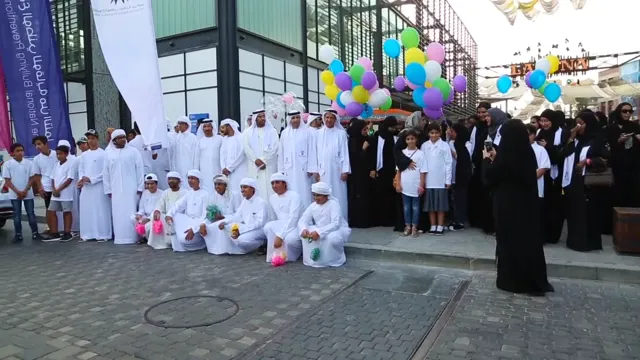 A large group of walkers with balloons